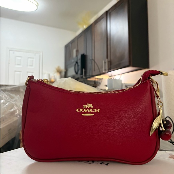 Coach Handbags - Coach Cherry Red Leather Wristlet